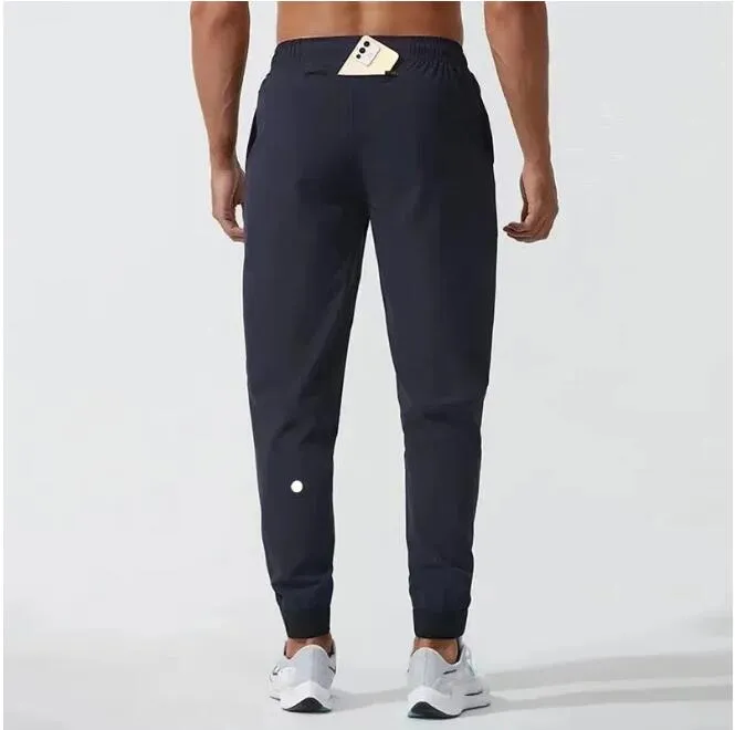 Yoga Pants LL Herr Jogger Long Pants Sport Yoga Outfit snabb torrt dragkammare Gymfickor Sweatpants Byxor Mens Casual Elastic Midje Fitness