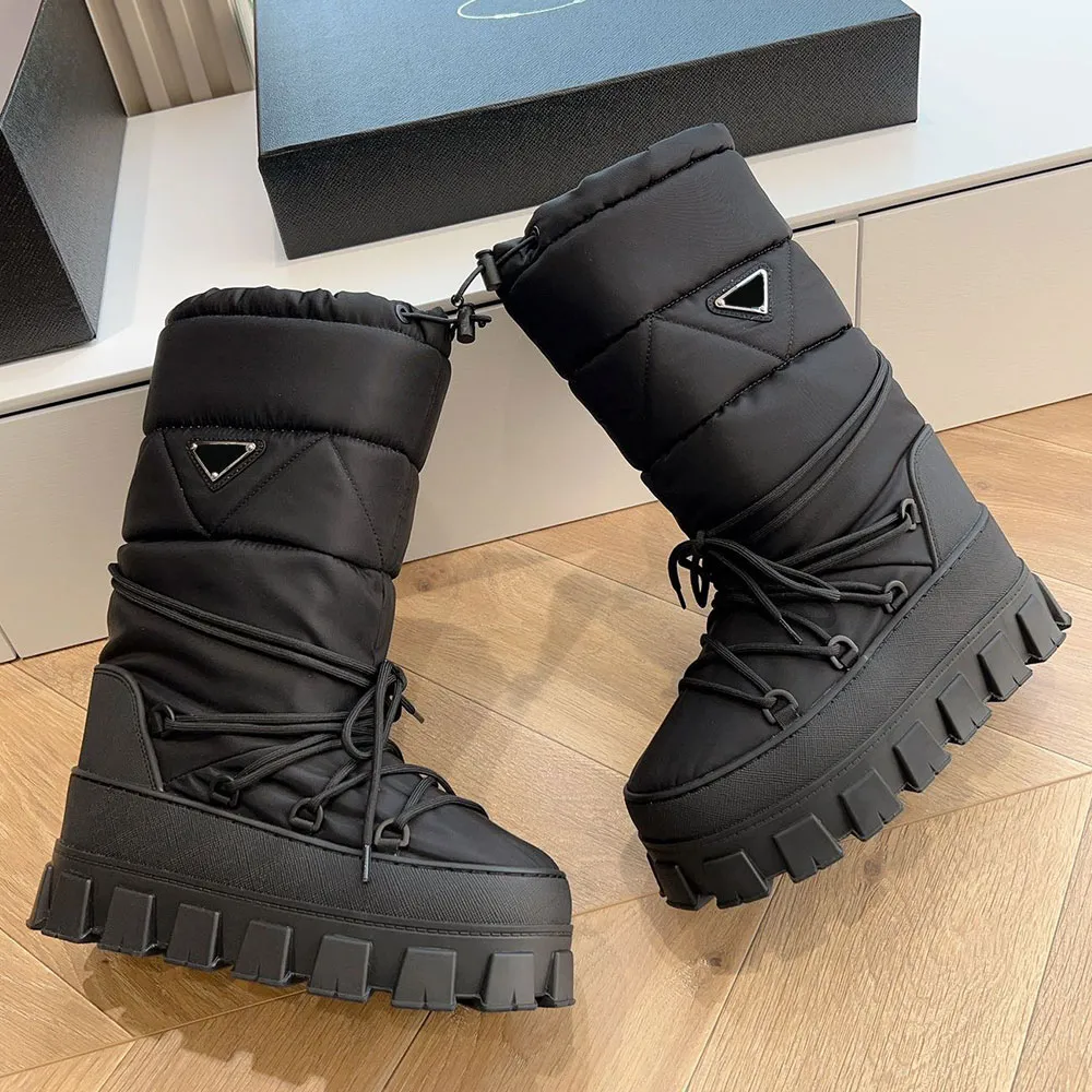 Nylon gabardine booties waterproof designer boots ski shoes lines compact platform details carefully studied For example upper equipped with removable socks