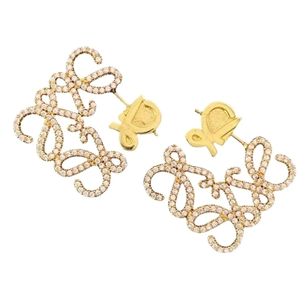 Boucles d'oreilles Lowewe Designer Luxe Mode Femme Dimensionnelle Trois Évider Géométrique Nouvelle Paire De En Deux Couleurs En Option Dans Le Style Ins Boucle D'oreille Tempérament