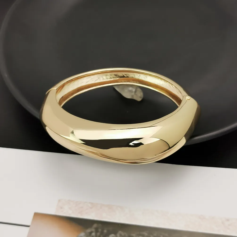 Off the Cuff Open Bangle Bracelet in Gold | Uncommon James
