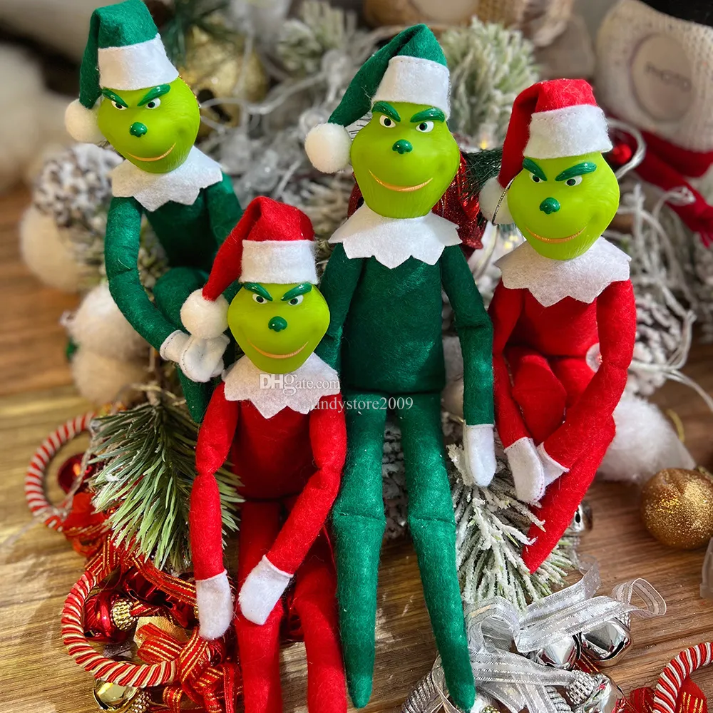 Jouet de Noël Le monstre de Noël en fourrure verte Tête en PVC avec corps en tissus non tissés Costume de Père Noël Rouge Vert Décoration de fête à la maison Cadeau pour enfants