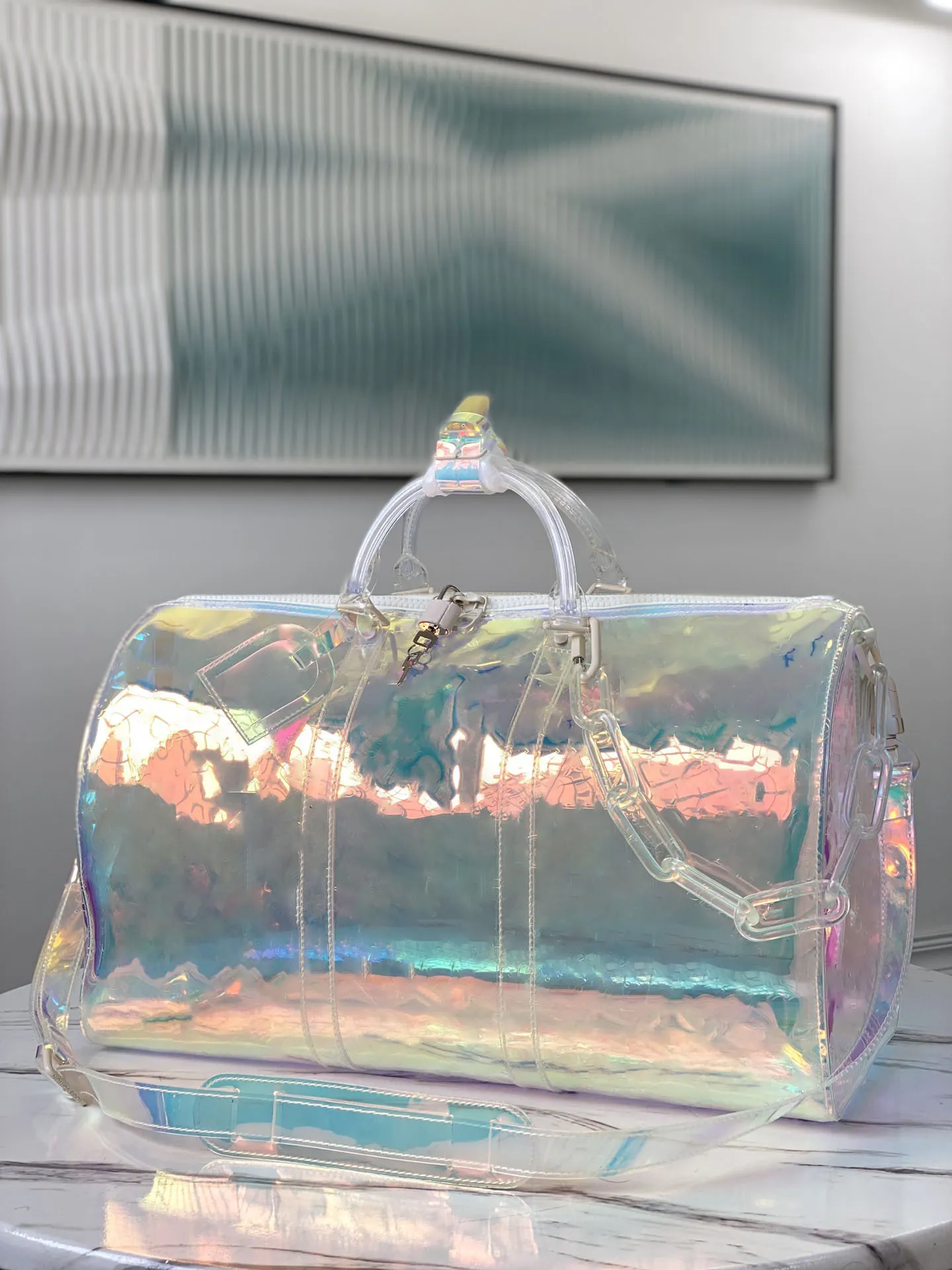 Lyxdesigner Keepall Colorful Prism Transparent tryck PVC Travel Bag Herr- och kvinnors designer Sportväska axelväska Crossbody Bag 50cm Modell: 53271