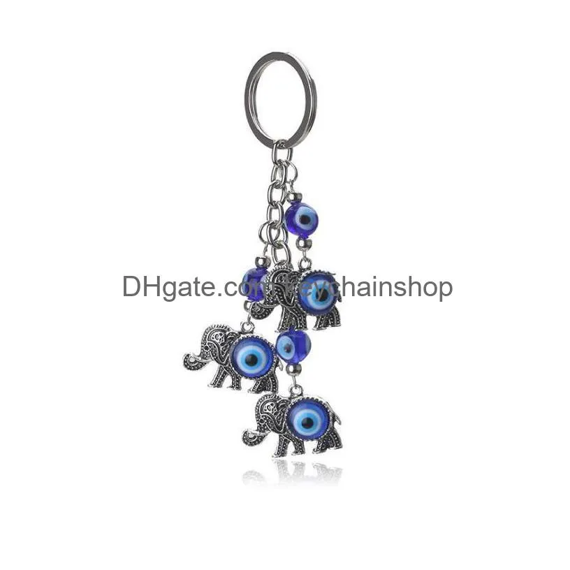 Porte-clés Lanyards Blue Eye Elephant Porte-clés Lucky Elephants Pendentif Porte-clés Devils Eyes Pendentifs Sac Voiture Drop Livraison Mode Acc Dhwh5