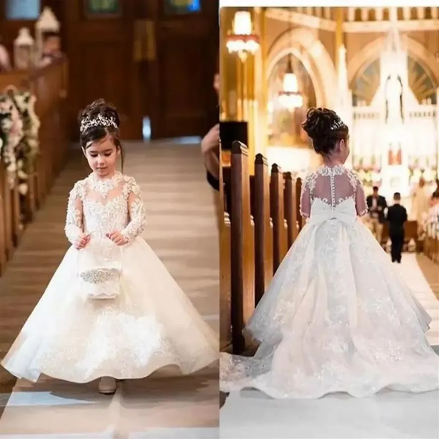 Adorabile abito da ballo bianco Abiti da ragazza di fiori Principessa Maniche lunghe trasparenti Appliques Gioiello Collo Abiti da festa di compleanno per bambini Abito B249A