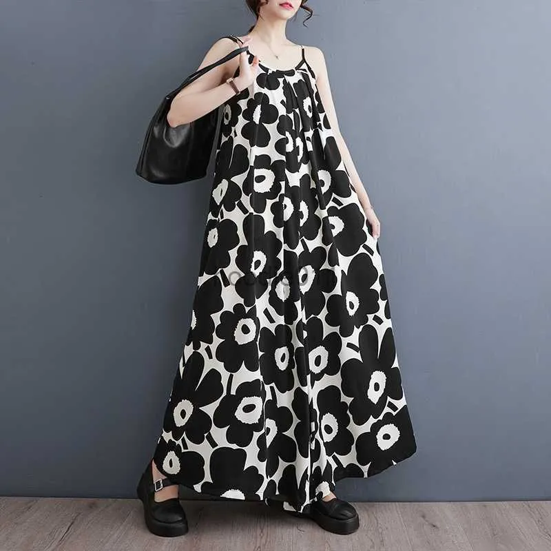 Kvinnors jumpsuits Rompers #6633 Black Backless Spaghetti Strap Jumpsuits Women Lose Thin Printed Sleeveless Wide Leg Jumpsuits Femme Sexy Overalls Summer L230926