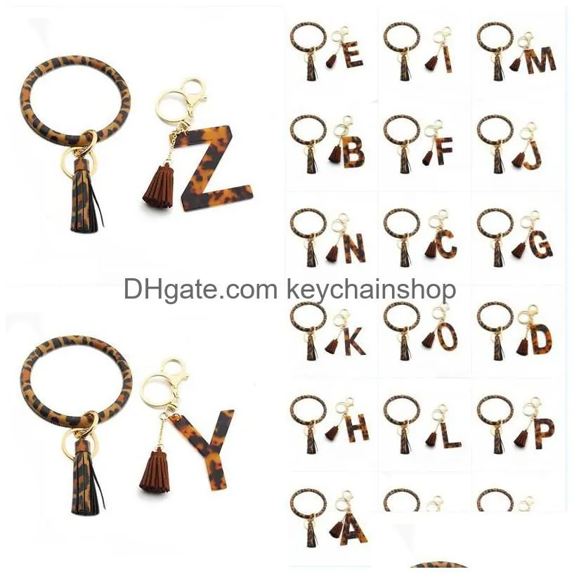 Nyckelringar akryl bokstäver armbands ring Tassel Leopard cirkel Bangle Keychains Chain Leather Keychain Armband för kvinnor Drop Leverans DHRL4