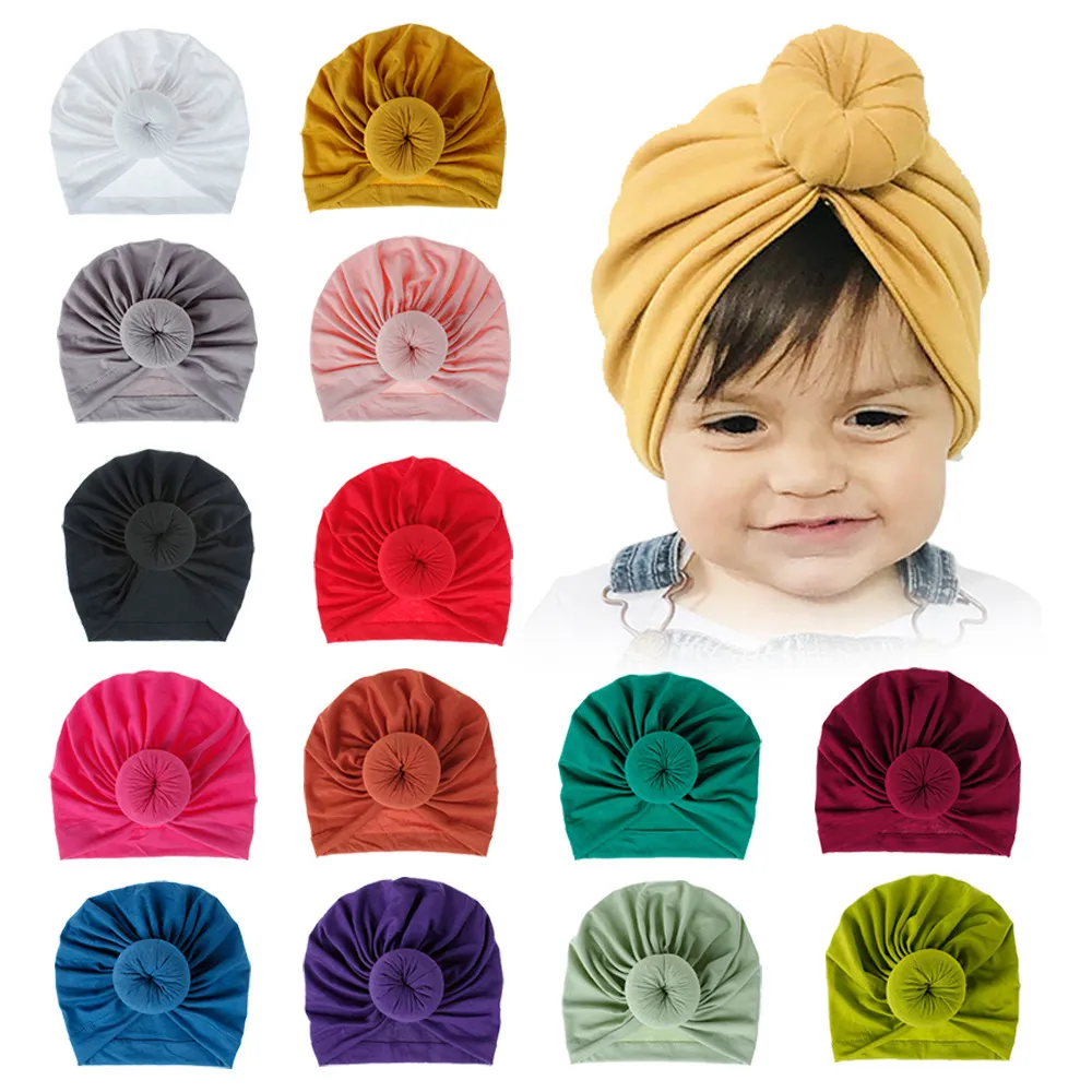 18 kleuren Kinderaccessoires Pasgeboren Peuter Kinderen Baby Jongen Meisje Tulband Katoenen muts Winter Warm Softs Cap Stevige knoop Zachte omslag dd328