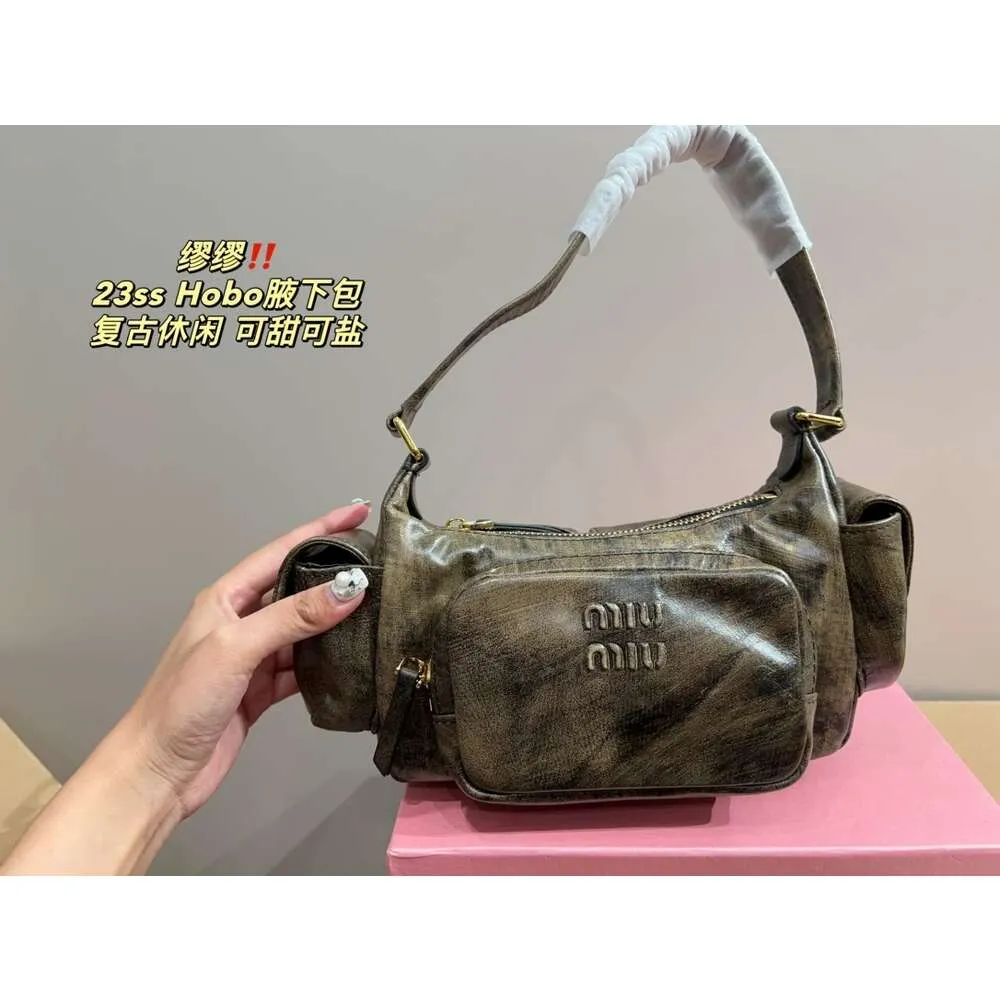 Miu Miu Blue Handbags with Cash Back | ShopStyle