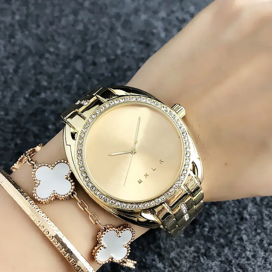 MKK zupełnie nowe zegarki dla kobiet Lady Girl Crystal Big Letters Style Metal Steel Band kwarcowy zegarek hurtowa bezpłatna wysyłka reloJ Mujer