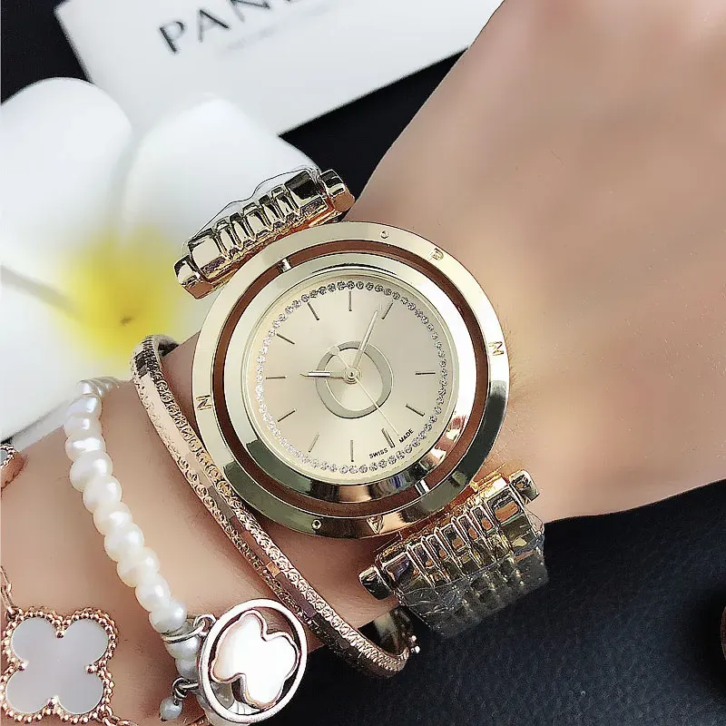 2023 Marca de moda caliente Mujer Chica Cristal Puede rotar Dial Estilo Banda de metal de acero Reloj de pulsera de cuarzo Envío gratis Venta al por mayor Orologi