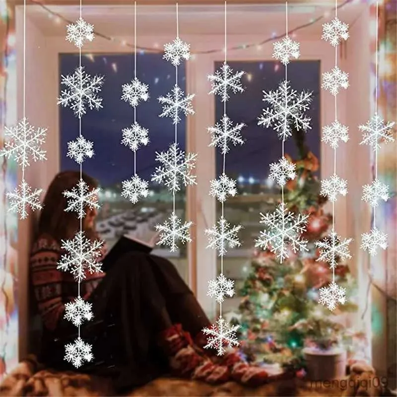 a) Children play with artificial snowflakes on Christmas