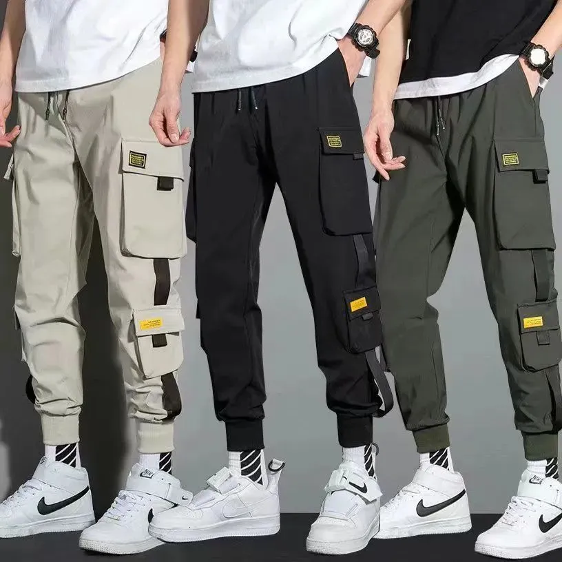 Pantalones para hombres Ropa de calle delgada Pantalones casuales Hombres Cintas Harem Pantalones para correr Hombre Slim Fit Pantalones cargo de primavera Multi-bolsillos Pantalones para mujer Jx1 230927