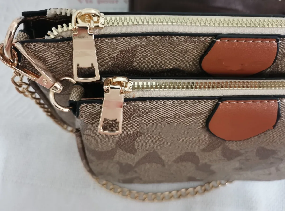 Groothandel verstelbare tape schouderriem crossbody verwijderbaar zakje ritssluiting handtassen metalen hardware messager tas driedelige set