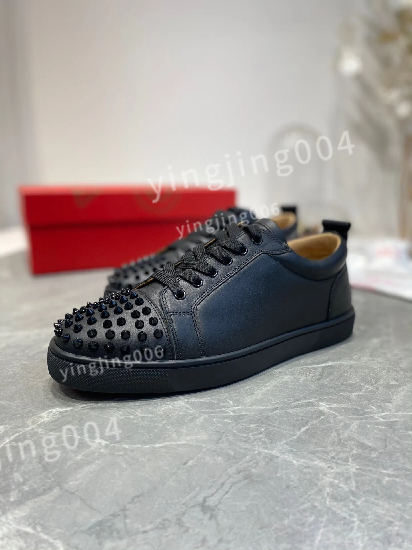 Designer red trainers sale