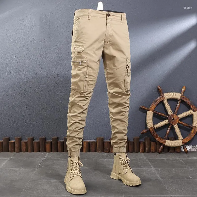 Męskie dżinsy streetwear mody masy multi kieszenie elastyczne swobodne spodnie ładunków hombre hip hop joggers kombinezonki wojskowe