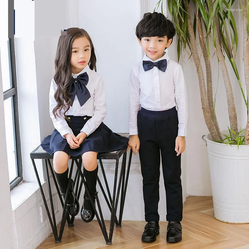 Kläder sätter barn bomull japanska koreanska skoluniformer flickor pojkar vita skjortor marinblå kjolbyxor dagis outfit