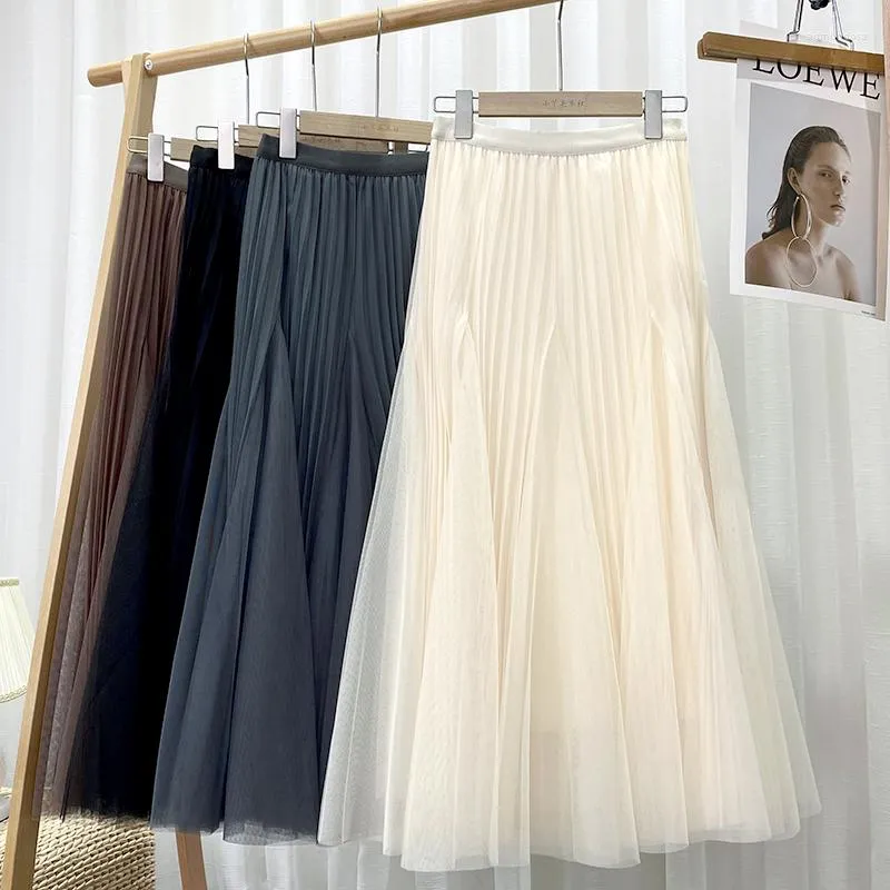 Skirts Solid Pleated Fairy Gauze Skirt Spring 2023 Slim Line Large Swing Medium Length Summer Versatile Elastic