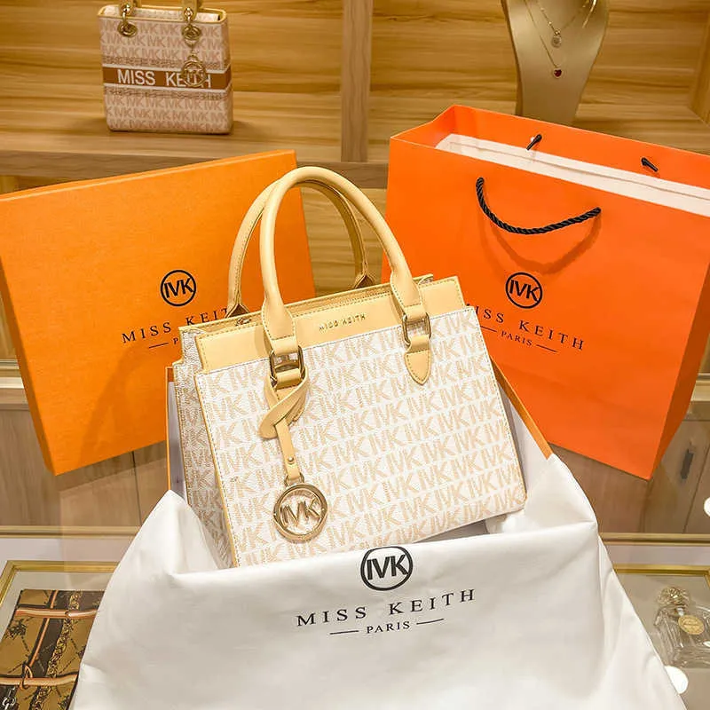 Nieuwe tas damesmode hand eenvoudige middelbare leeftijd sfeer sfeer moeder's luxe