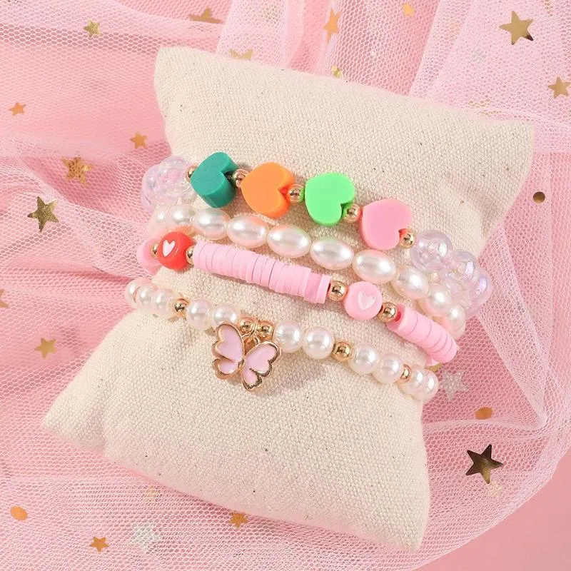 STRAND 4PCS SET Mooie roze klei hart armband mode parel handgemaakte kralen vlinder hanger elastische armband voor meisjes sieraden geschenken