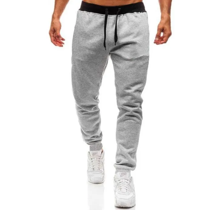 2022 Marque de mode logo Gymnases pour hommes Pantalons Joggers Fitness Casual Pantalons longs Hommes Femmes Workout Skinny Pantalons de survêtement Jogger Survêtement Pantalon