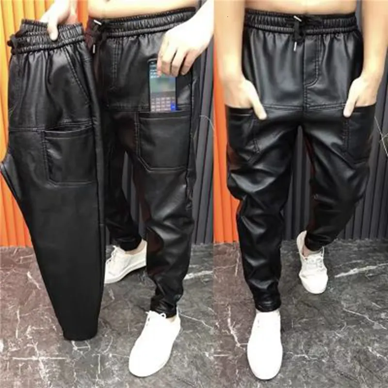 Calça masculina cintura elástica de couro FAUX Bolsas de zíper de zíper preto roupas de rua pretas de lápis 230105