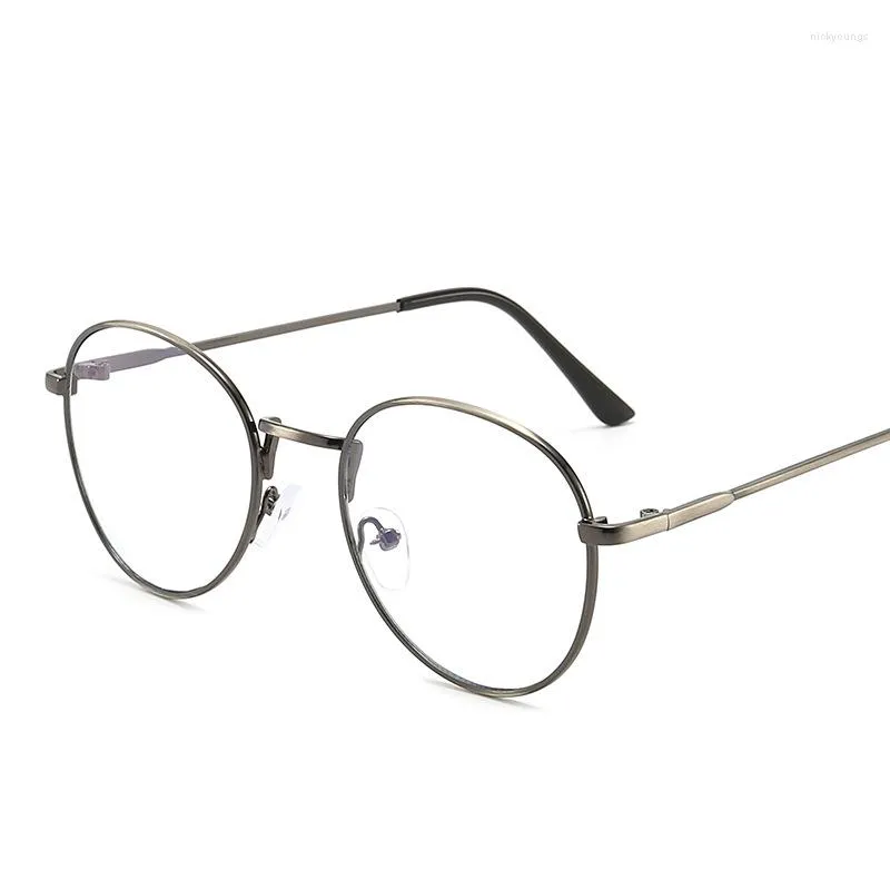 Óculos de sol Bolsas de metal oval escovado espelho plano masculino e feminino Os óculos literários Retro simples podem ser combinados com miopia