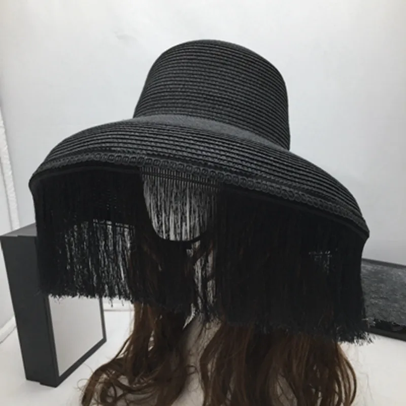 Breda randen hattar hink retro hattar svart tofs scen stora takfot kvinnliga sol mode show liten och mysterium i ansiktet 230106
