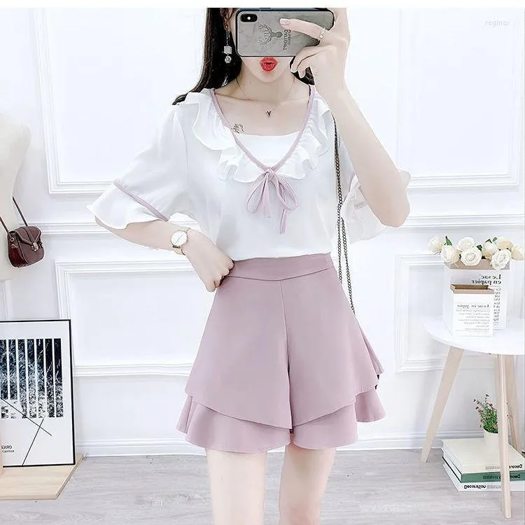 TRABALHO FEMNIMAIS FEM RUSTES 2023 MULHERES DE VERÃO DECEMENTO DE 2 Peças feminino Chiffon Camisa de manga curta Tops Senhoras altas cintura larga shorts Suits S143