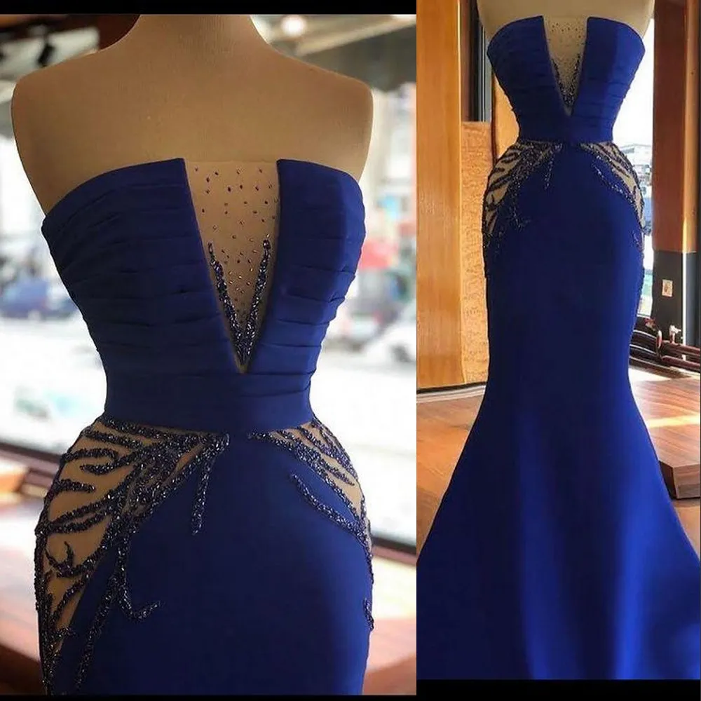 2023 Abiti da ballo Arabo Sexy Royal Blue Mermaid Senza spalline Illusion Buco della serratura Perline di cristallo Sirena Cutaway Sides Lunghezza del pavimento Aso Ebi Abiti da sera Vestidos