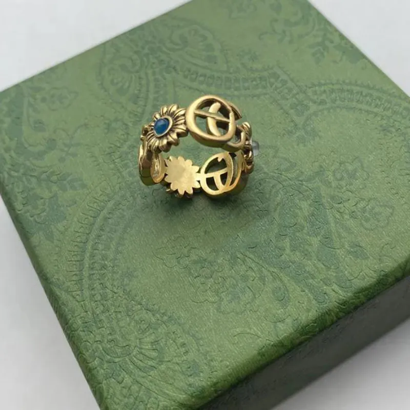 Pierścień designerski Złoty wzór kwiatów Pierścienie miłosne Blue Diamond Fashion Women Biżuteria Mężczyźni lśniący litera z pudełkiem