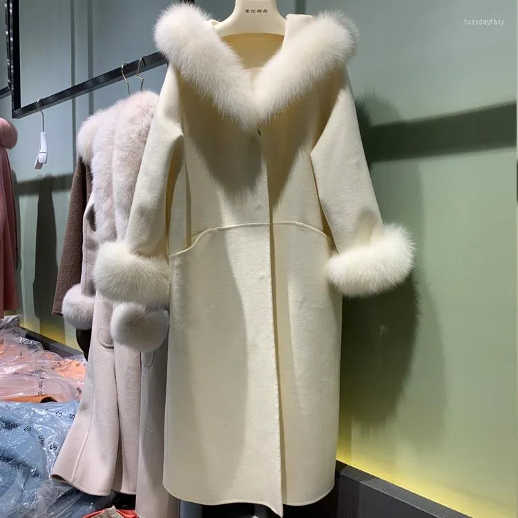 Pelliccia da donna Autunno Inverno 2023 Cappotto lungo da donna in vera lana di cashmere con polsini genuini Capispalla per trench femminile con cappuccio allentato