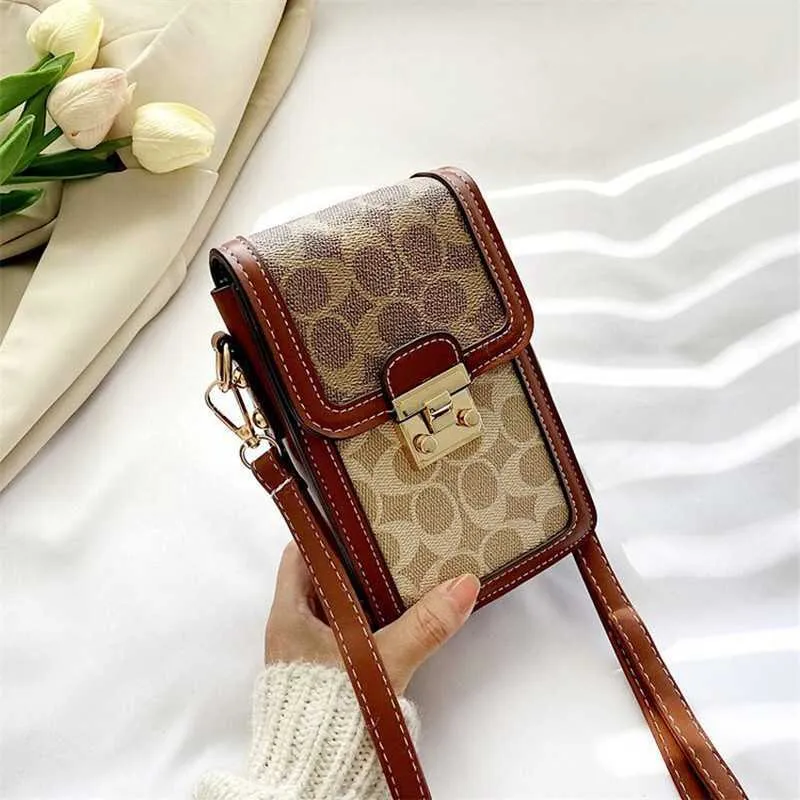 Cross Body 2022 Nova Mini Bolsa para Celular Bolsa Cosmética Moda Mensageiro Moda Feminina Rua Versátil Contraste Luz Luxo Bolsa Transversal 011123H