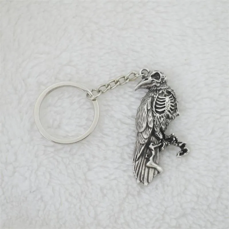 Keychains 12pcs Odin Raven Keychain Fibula Keyrings Black Bird Bird Amulet Viking Jóias para homens