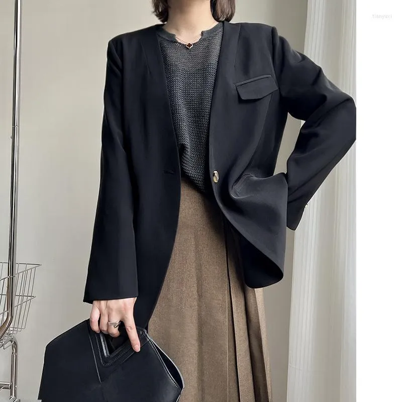 Feminino feminino Blazer preto feminino Mulheres nicho Tops 2023 Primavera e outono Suivo casual solto de cor sólida francesa cem