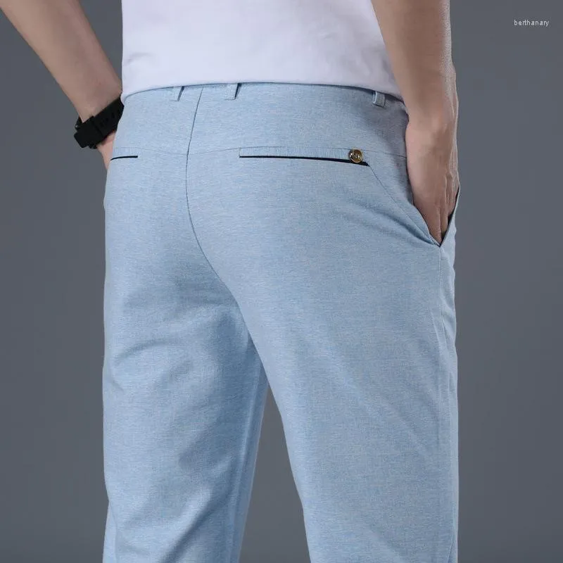 Мужские брюки 2023 летние хлопковые повседневные мужчины тонкая дышащая прямая мода Khaki Grey Blue Blouns Мужские брюки.