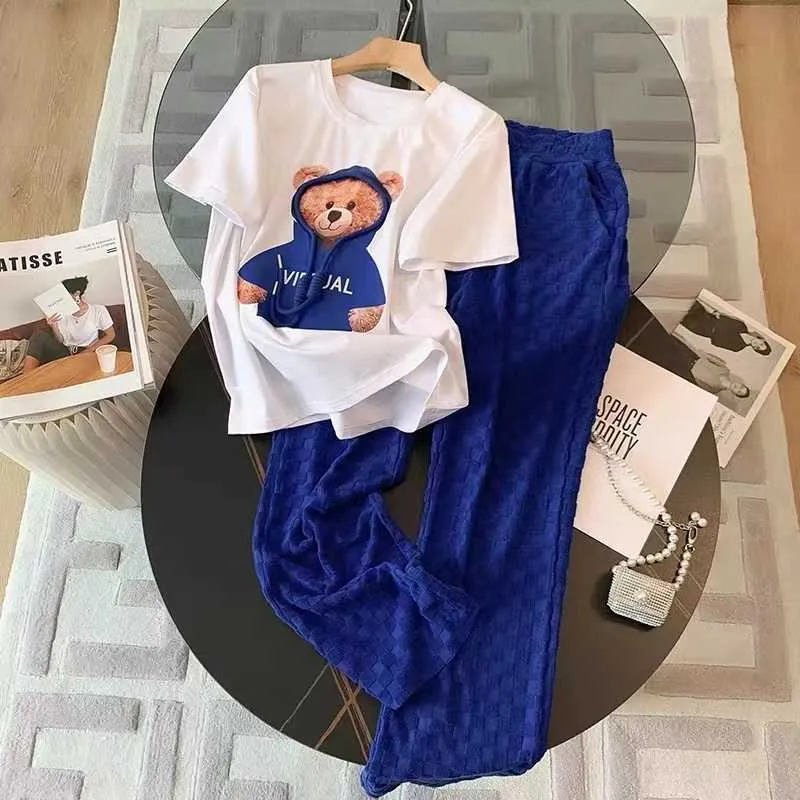 Dwuczęściowa sukienka Słodka kreskówka Kardyna biały niedźwiedź nadruk O-Neck T-shirt Blue Elastic Talia Spodnie 2 sztuki