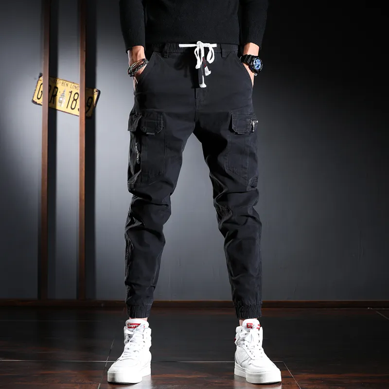 Heren jeans streetwear mode plus maat 2842 multi -zakken casual vrachtbroek hombre hiphop joggers overalls losse broek 230113