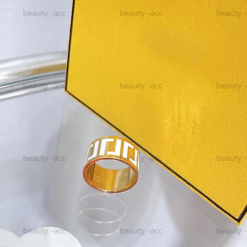 Designer de an￩is de esmalte para mulheres j￳ias de luxo Anel de casamento simples para homens com grava￧￣o anel de letra de letra de ouro elegante c￭rculo elegante com caixa