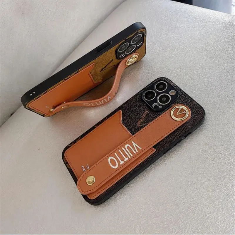 Cajas de teléfono de cuero de diseñador Cubierta trasera a prueba de golpes Luxurys Wallet Funda de teléfono para iPhone 14 13 12 11 Pro Max X Xs Xsmax con correa