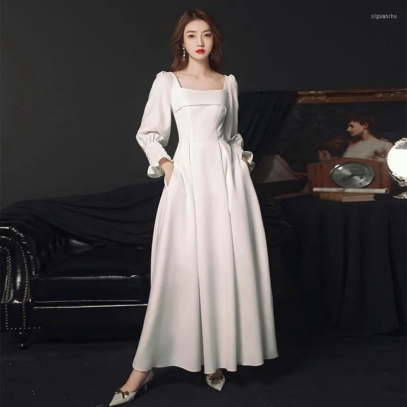 Etnische kleding witte elegante avondjurk 2023 herfst Franse stijl satijnen lange mouwen lange banket kleine vrouw