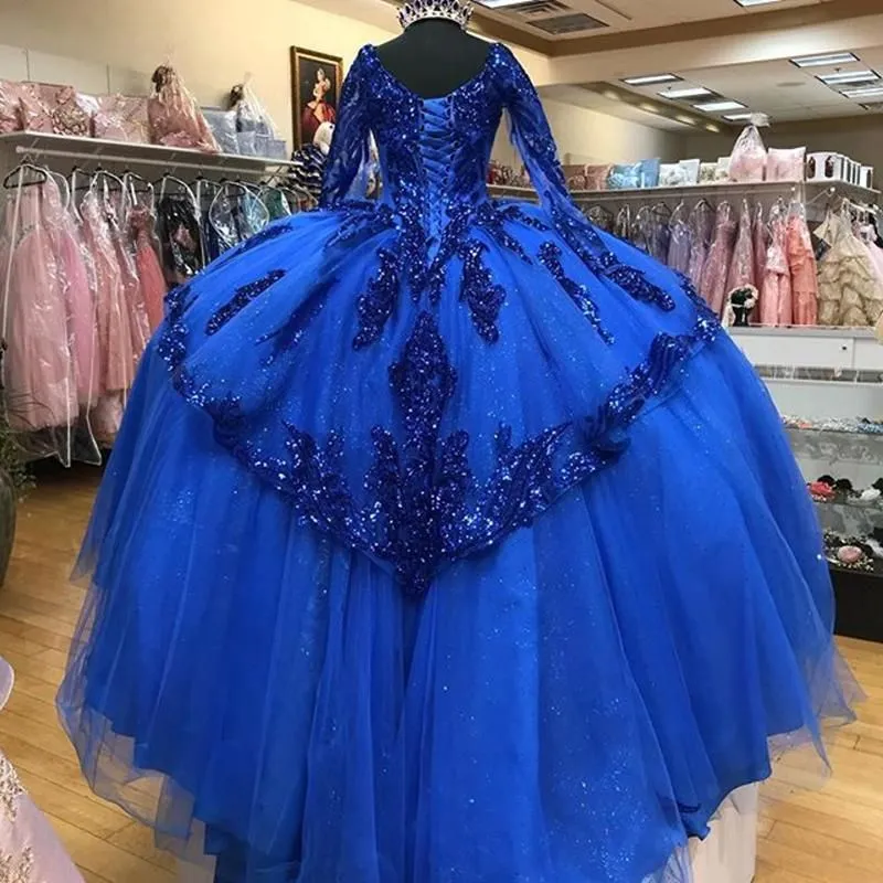 Abiti Quinceanera blu reali Paillettes Applique maniche lunghe Scollo a V Increspature a strati Tulle su misura Dolce principessa Abito da ballo Abiti eleganti