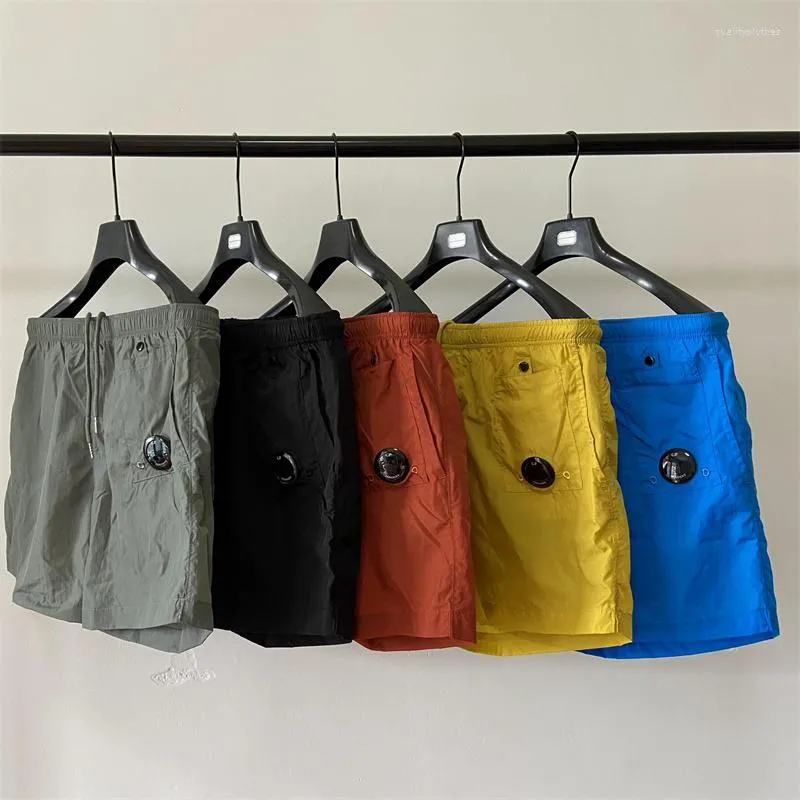 Pantalones cortos para hombres CP Verano Hombres y mujeres Ocio al aire libre Deportes Nylon Playa suelta Pantalones de tres puntos Casual