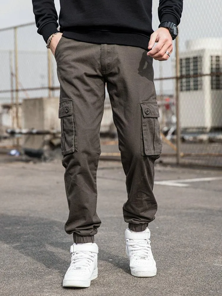 Mäns byxor militär stil män avslappnad last sido baggy multi-ficks design svart grön khaki grå bomulls fotled bandbyxor 2023men