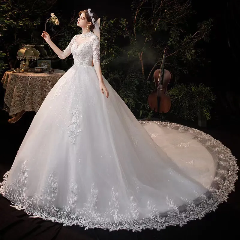 2023 Abiti da sposa in tulle Abiti da sposa eleganti Illusione Bella manica lunga A-Line Scollo Appliques Abito da principessa su misura a strascico