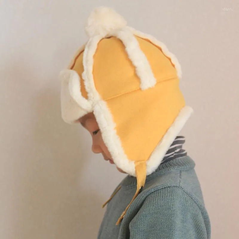 Boinas Sombreros de invierno esponjosos para niño niño niña bombardero sombrero con orejeras grueso cálido felpa bereber polar pompón gorra