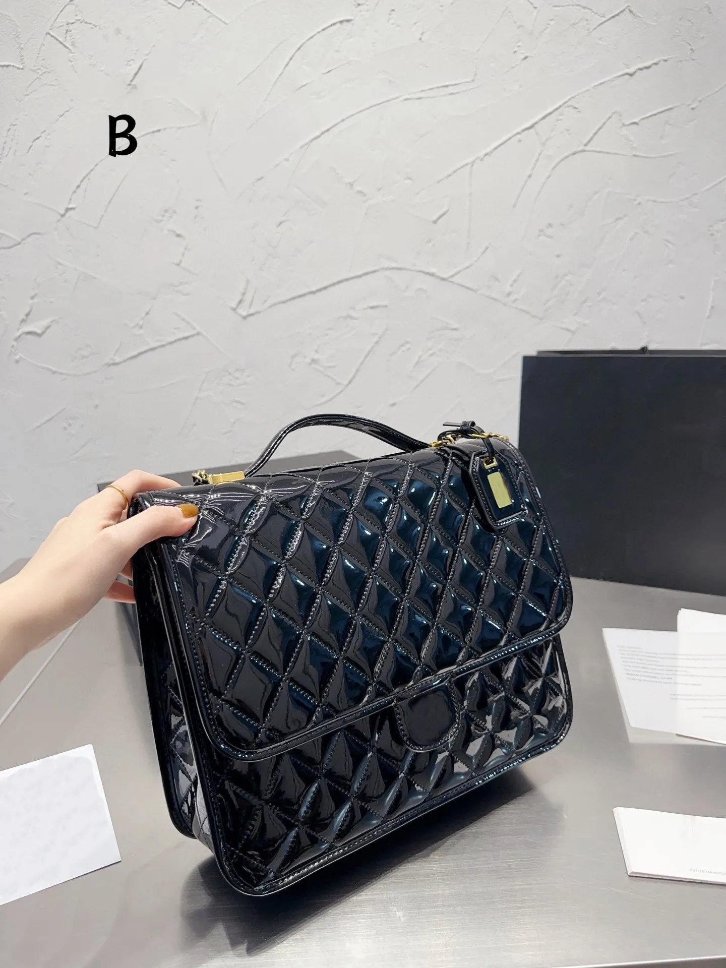 22K CC Mochila Bolsos de diseñador Popular Dos correas Bolsos escolares Mujeres Bolsos de lujo negros Bolsos de marca clásica de charol Bolsos de moda para mujer Bolsos de mano grandes