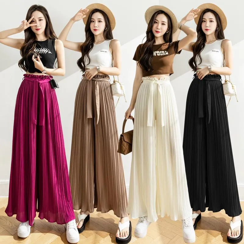 Kvinnors byxor capris kvinnlig koreansk modekvinna culottes kvinnor bandage veckad bred ben byxa sexig byxa kjol bottnar 2women's