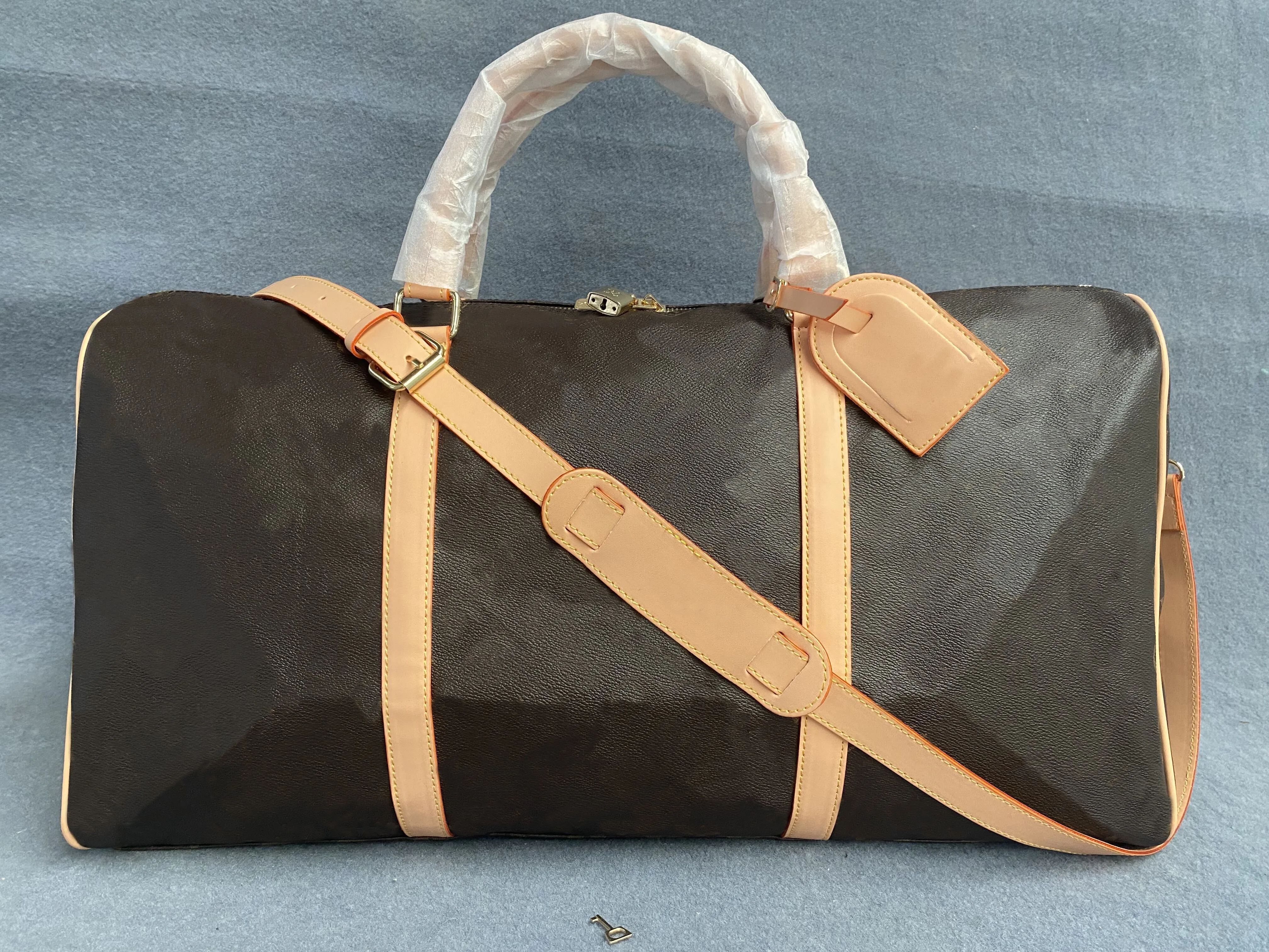 Fake designer travel bags hotsell