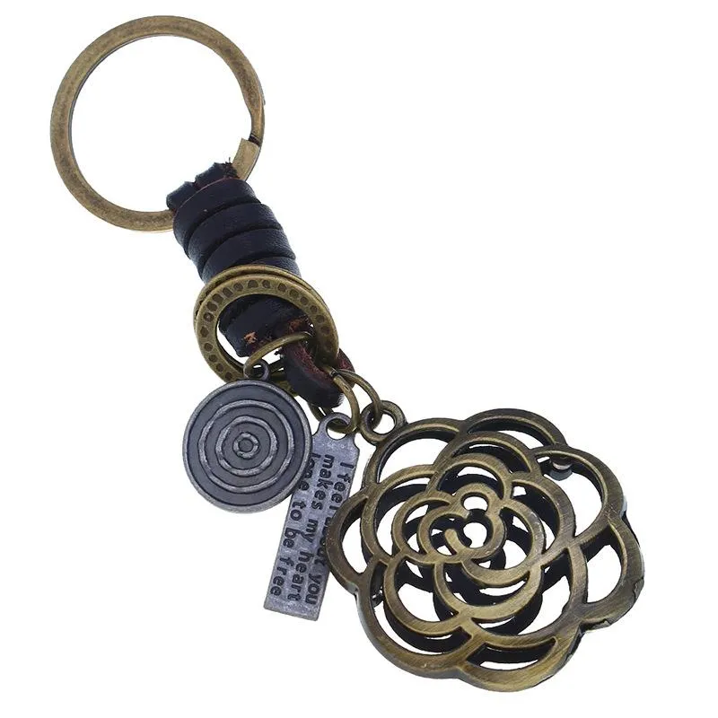 Keychains Vintage Bronze Alloy Hollow Out Flower Charm Woven Leather Lettering Metal Keyrings Pendant Key Chain Trendy Jewelry