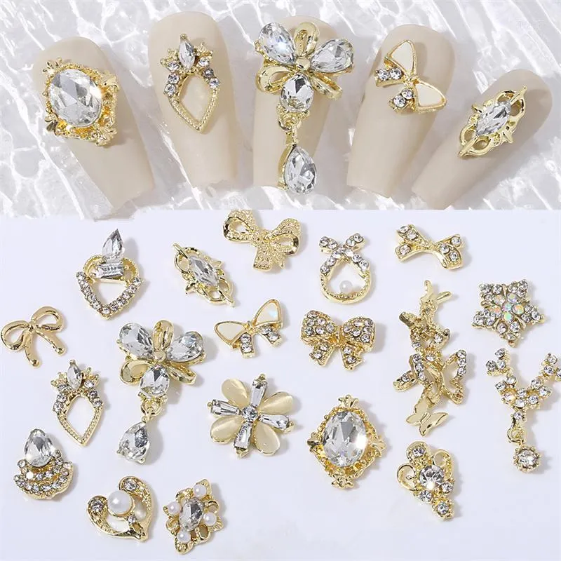 Décorations d'art d'ongle 20pcs Alliage de luxe Strass Bijoux Charms Glitter Cristal Perle Bow Ornements Métal Gems Design DIY Manucure Decorat